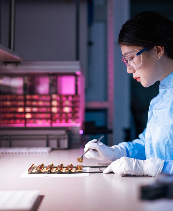 Jenoptik employee with laboratory equipment